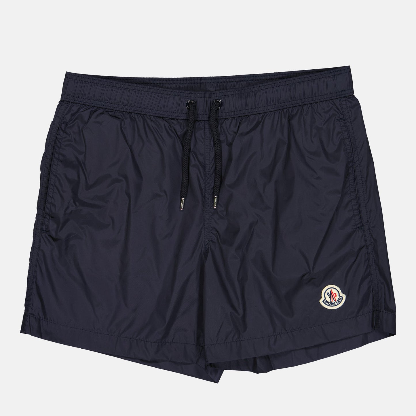 Moncler swim shorts, blue swim shorts, luxury beachwear, high-end swimwear, designer swim shorts