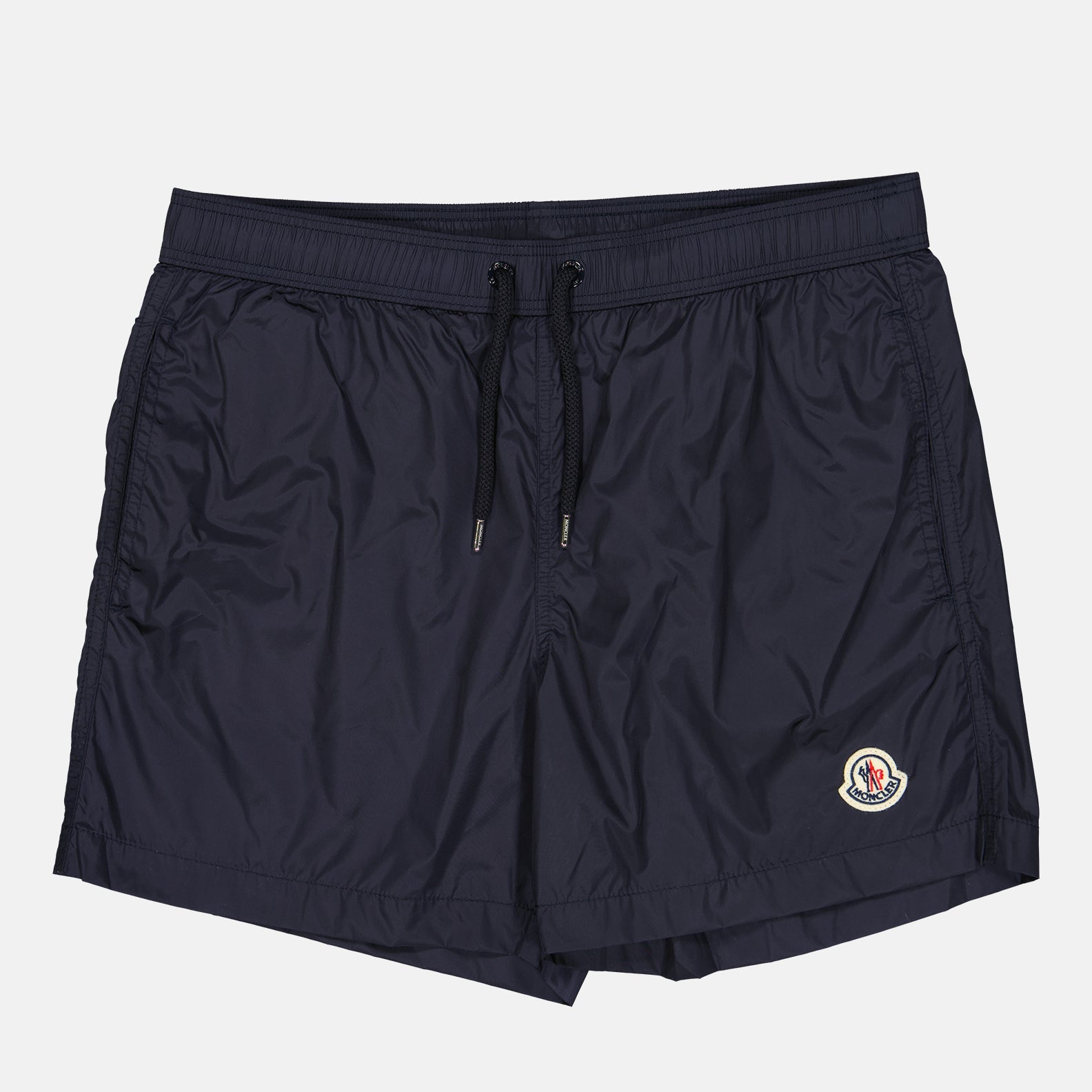 Moncler swim shorts, blue swim shorts, luxury beachwear, high-end swimwear, designer swim shorts