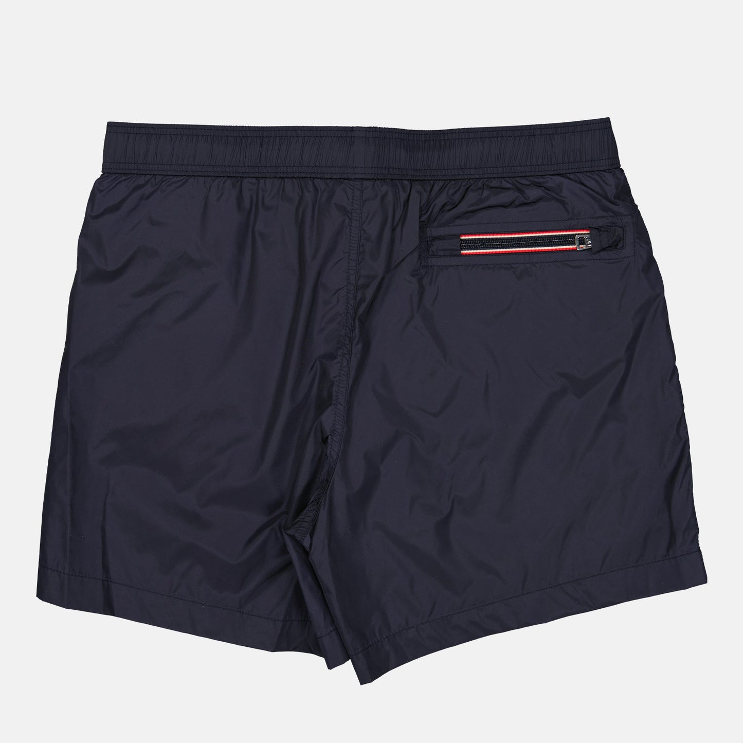 Moncler swim shorts, blue swim shorts, luxury beachwear, high-end swimwear, designer swim shorts