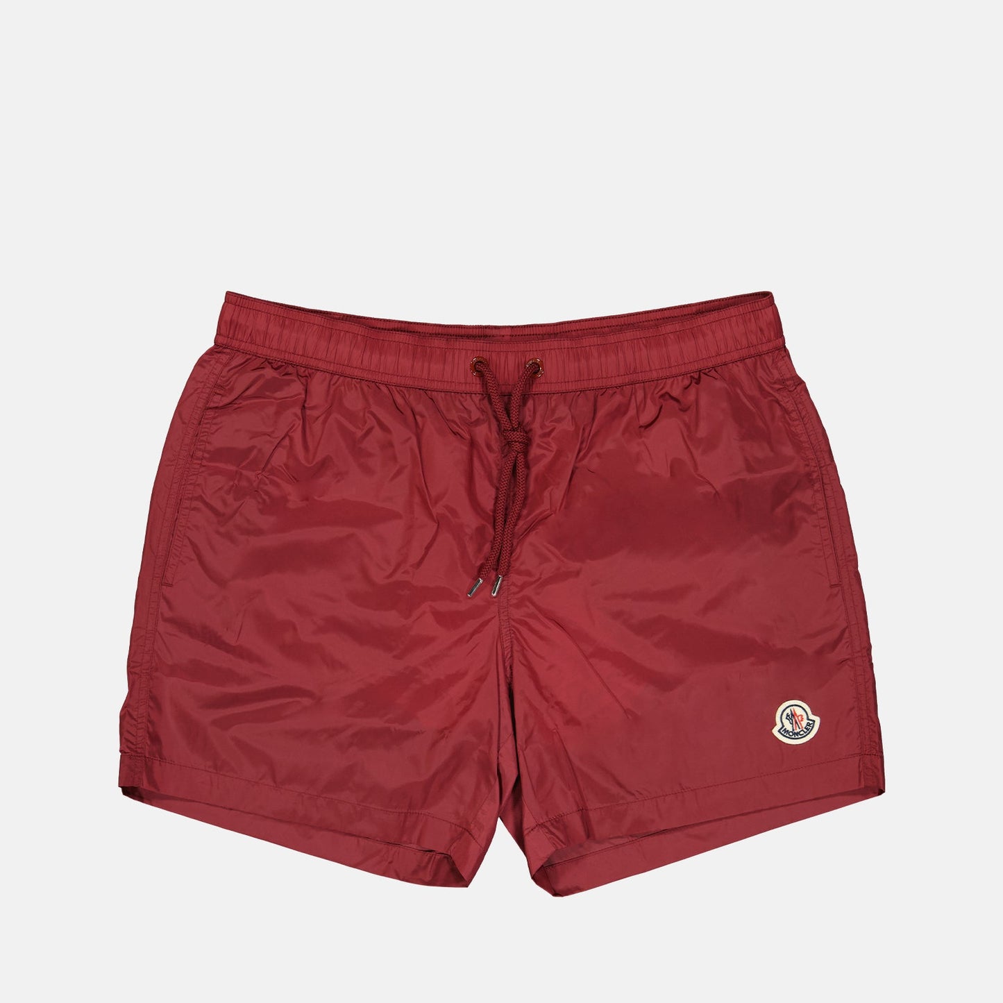 moncler swim shorts, burgundy logo shorts, luxury swimwear, premium swim shorts, high-end beachwear