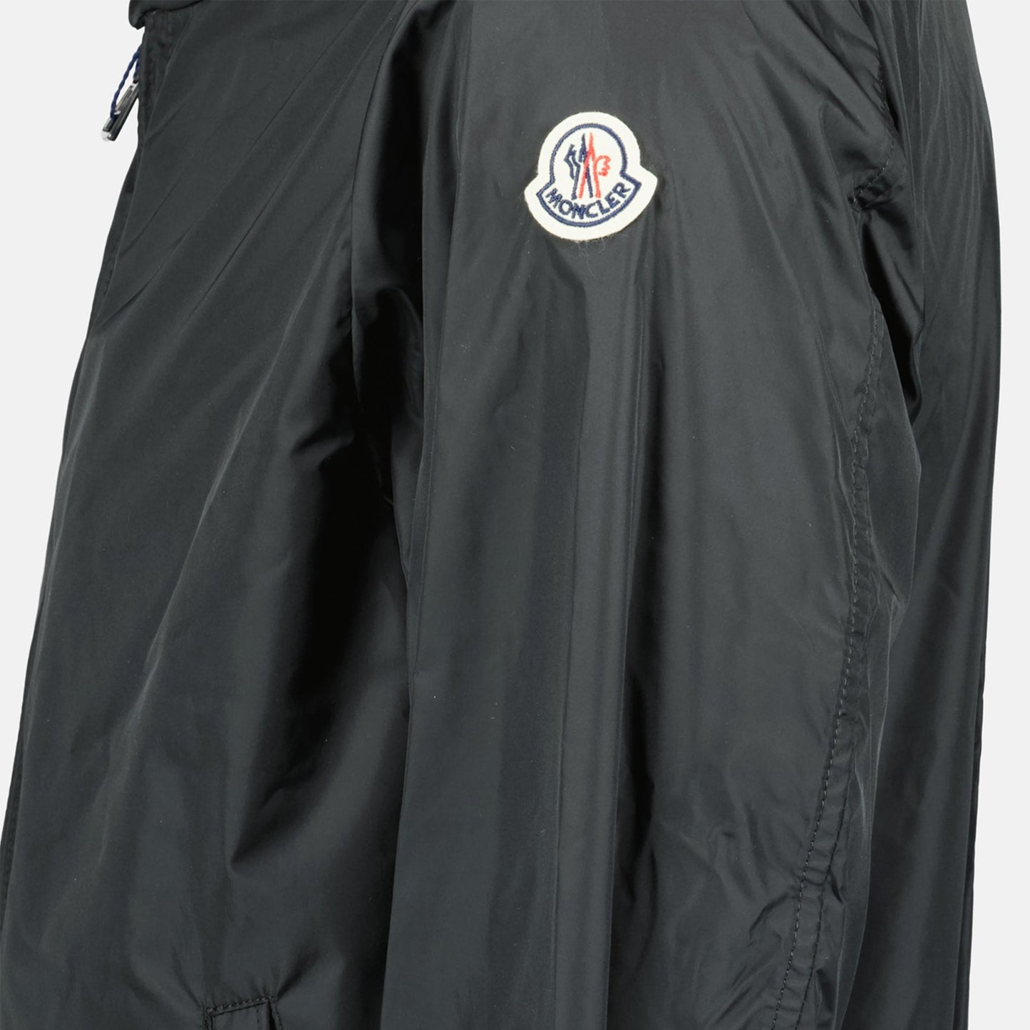 Moncler, luxury windbreaker, black jacket, men's fashion, high-end outerwear