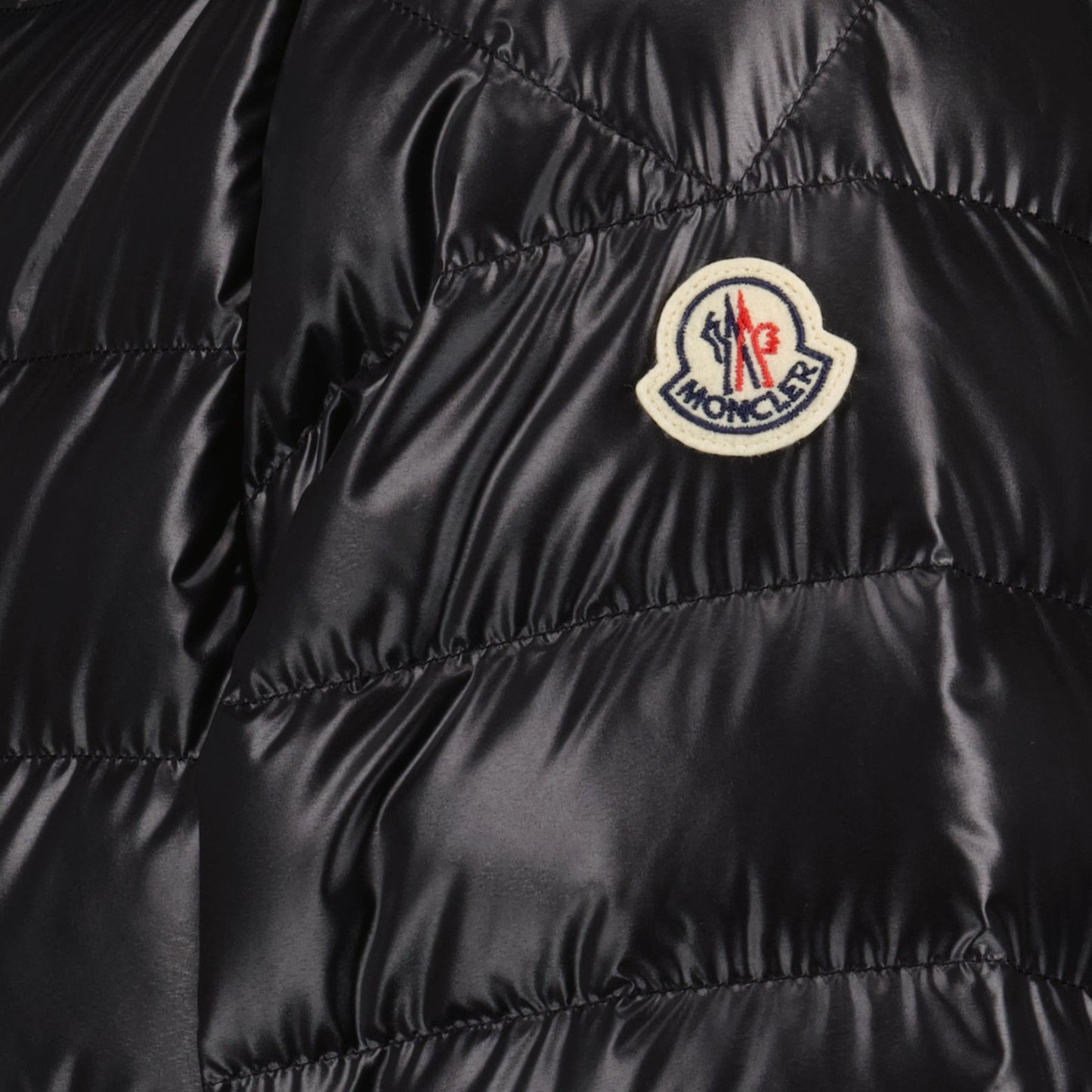 luxury down jacket, black nylon jacket, Moncler Cornour, premium outerwear, sophisticated jacket