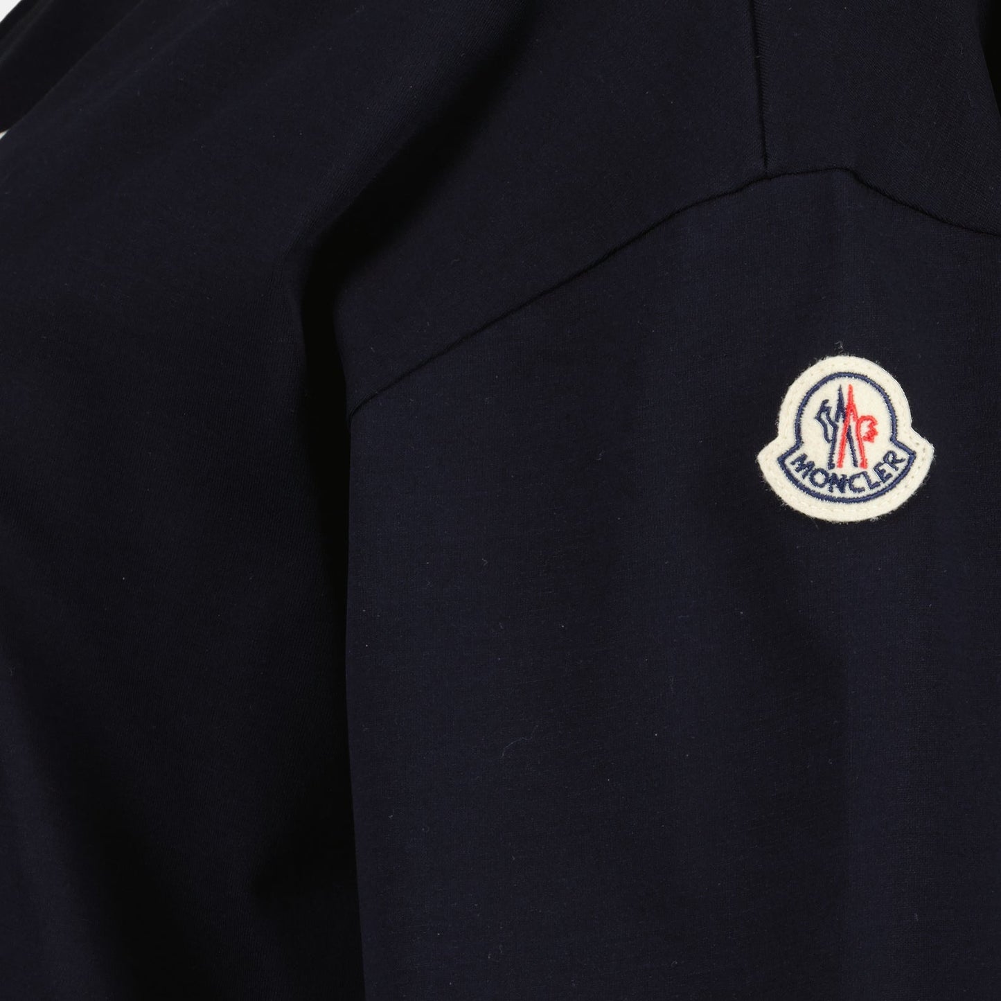 Moncler polo, navy blue polo, luxury casual wear, elegant polo shirt, high-end polo