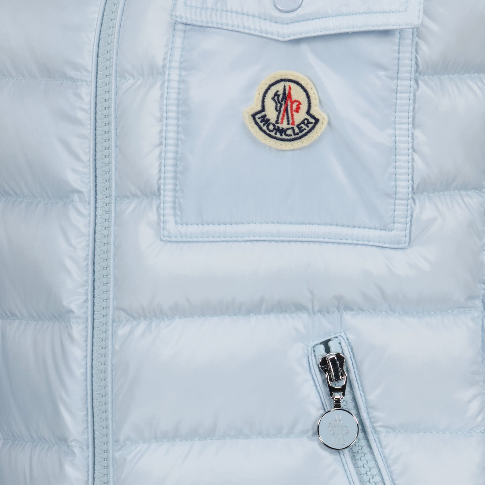 luxury vest, Glygos, sleeveless blue vest, Moncler fashion, high-end fashion