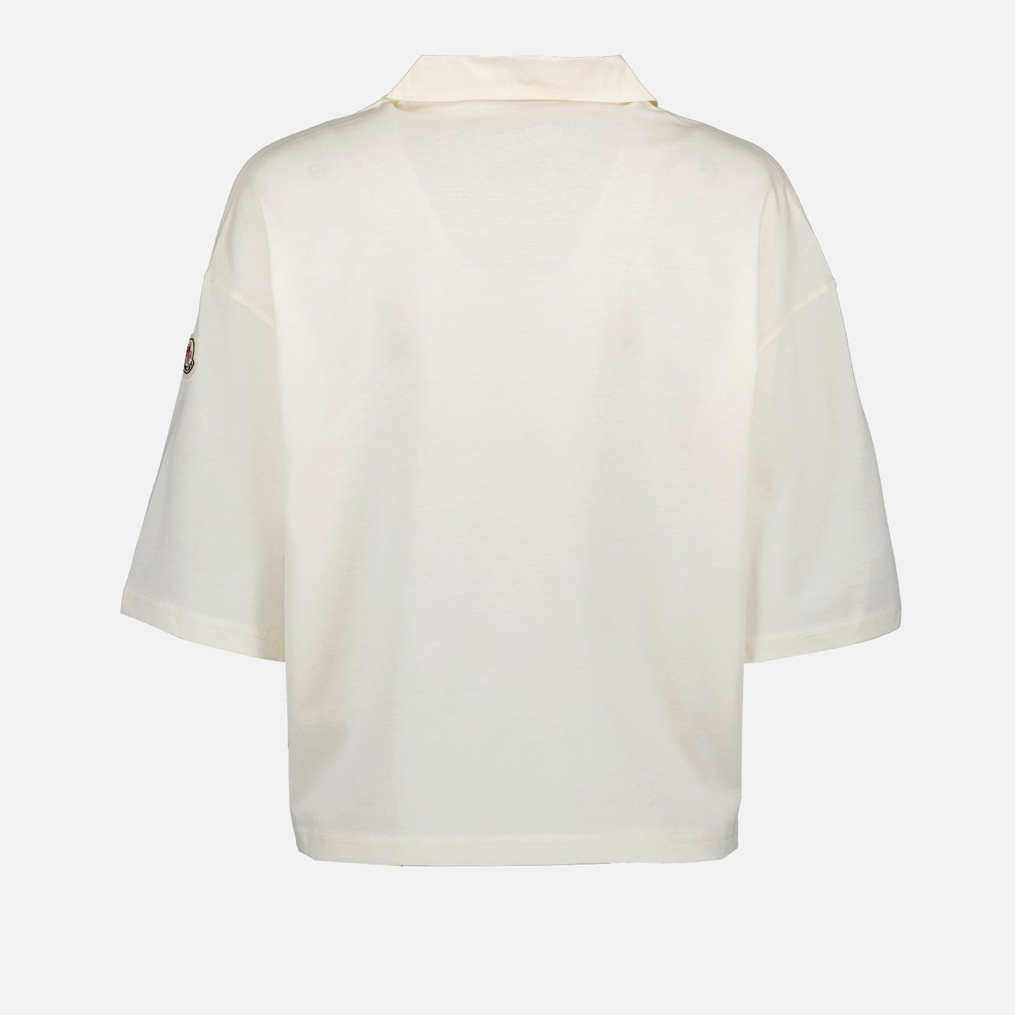 Moncler polo shirt, luxury casual polo, classic white polo, high-end fashion, refined elegance