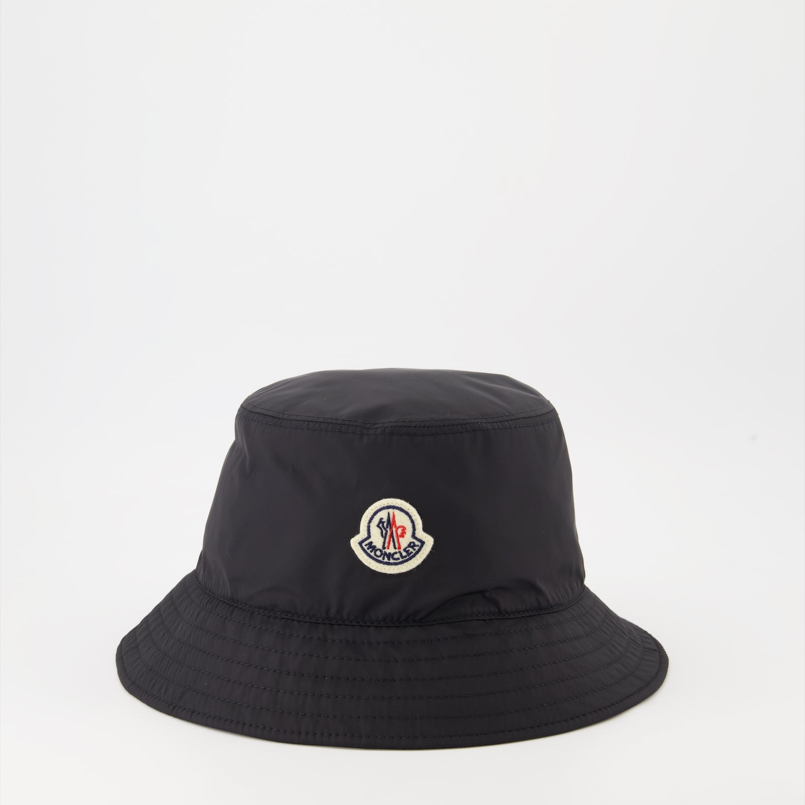 luxury bucket hat, nylon bob hat, Moncler accessory, high-end fashion hat, designer headwear