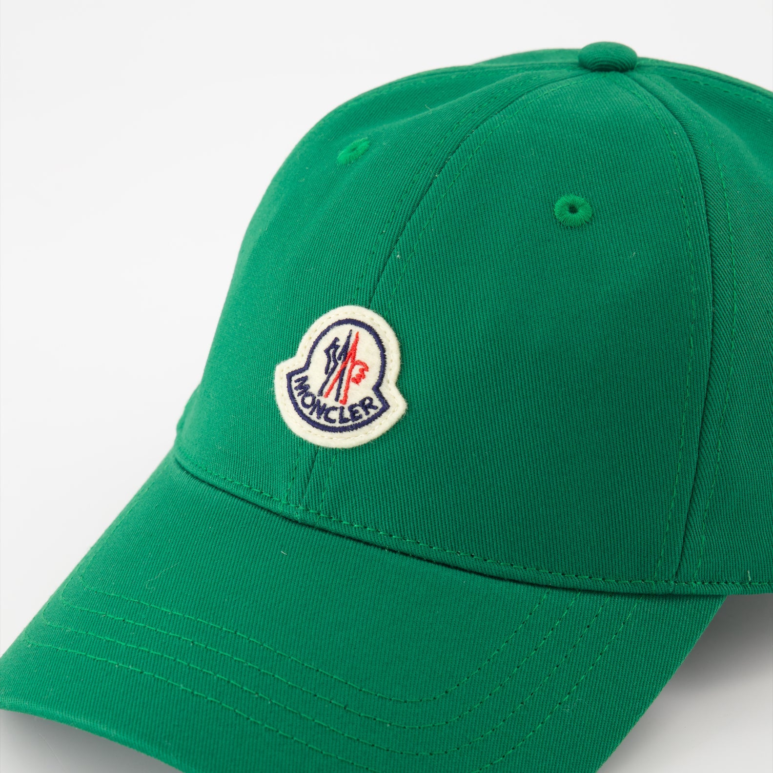 luxury cap, Moncler logo cap, green baseball cap, elegant accessories, designer cap