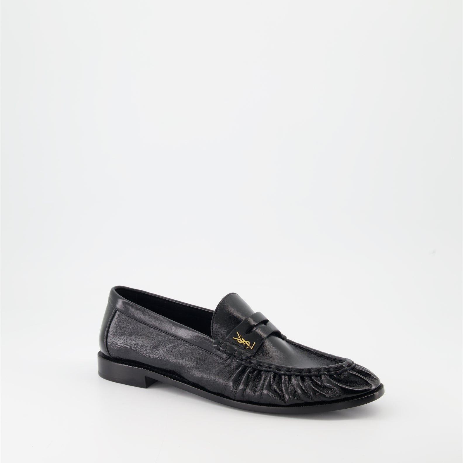 Cassandre leather moccasins, luxury footwear, Saint Laurent shoes, elegant menswear, glossy leather moccasins