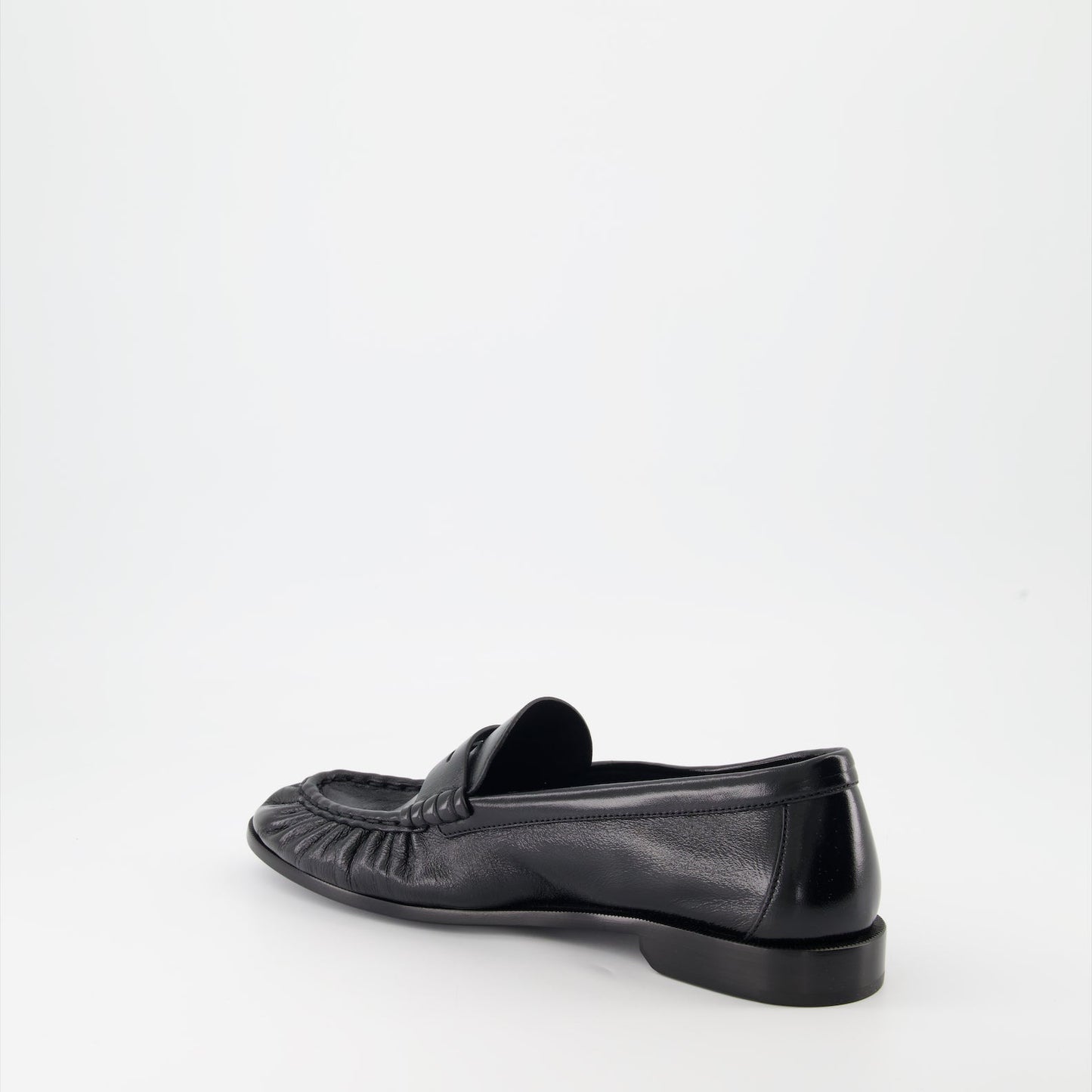 Cassandre leather moccasins, luxury footwear, Saint Laurent shoes, elegant menswear, glossy leather moccasins