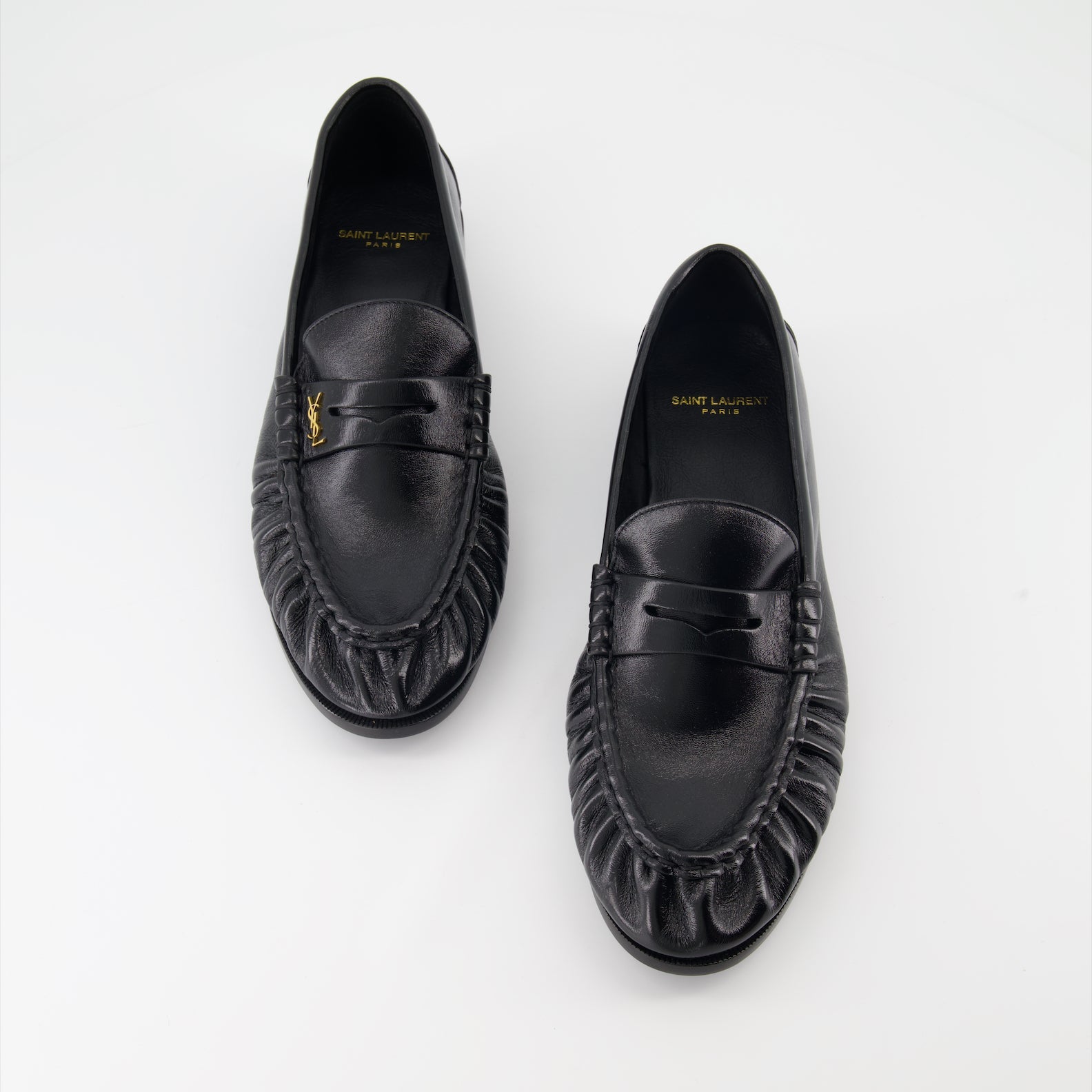 Cassandre leather moccasins, luxury footwear, Saint Laurent shoes, elegant menswear, glossy leather moccasins