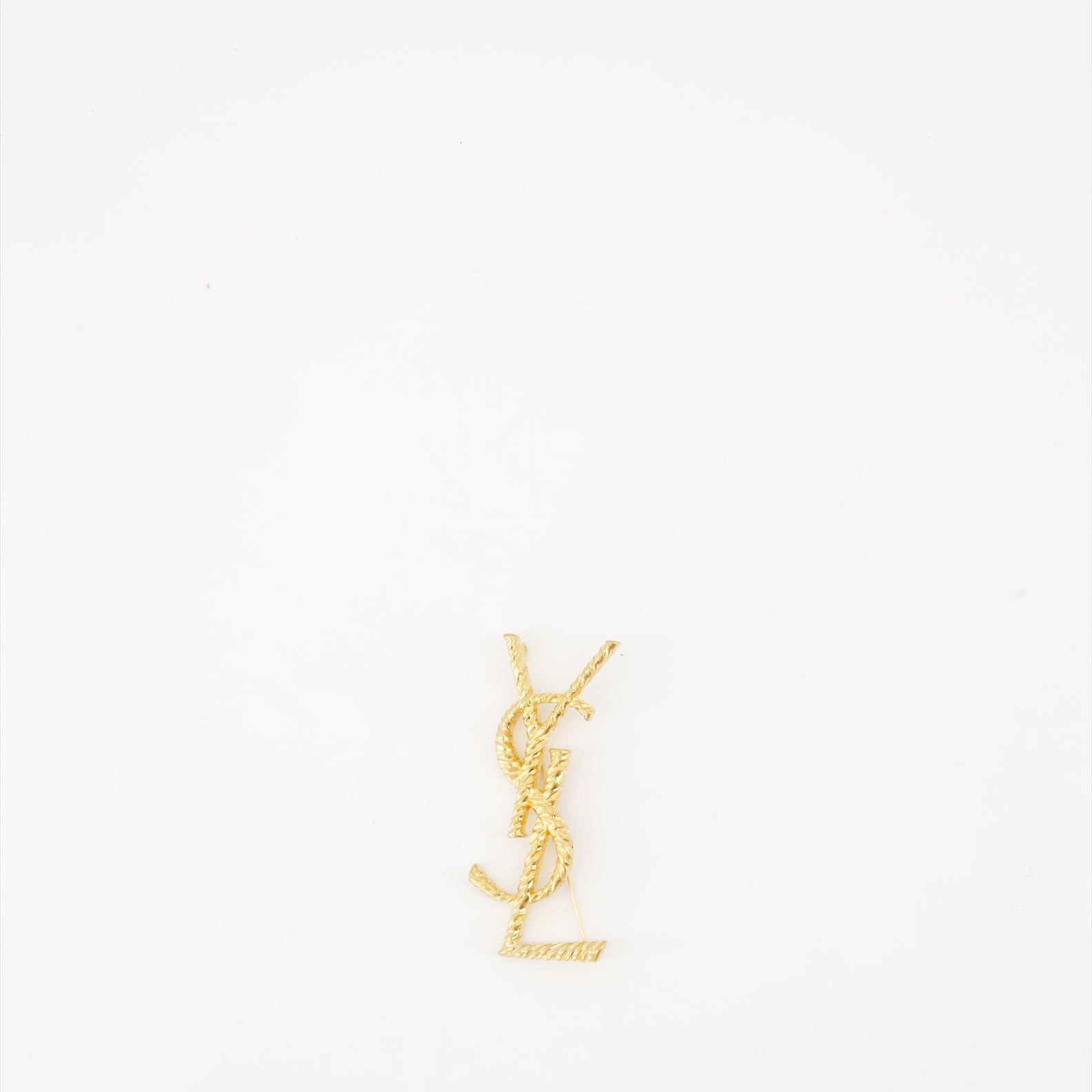 Cassandre brooch, golden brooch, Saint Laurent accessory, luxury brooch, elegant accessory