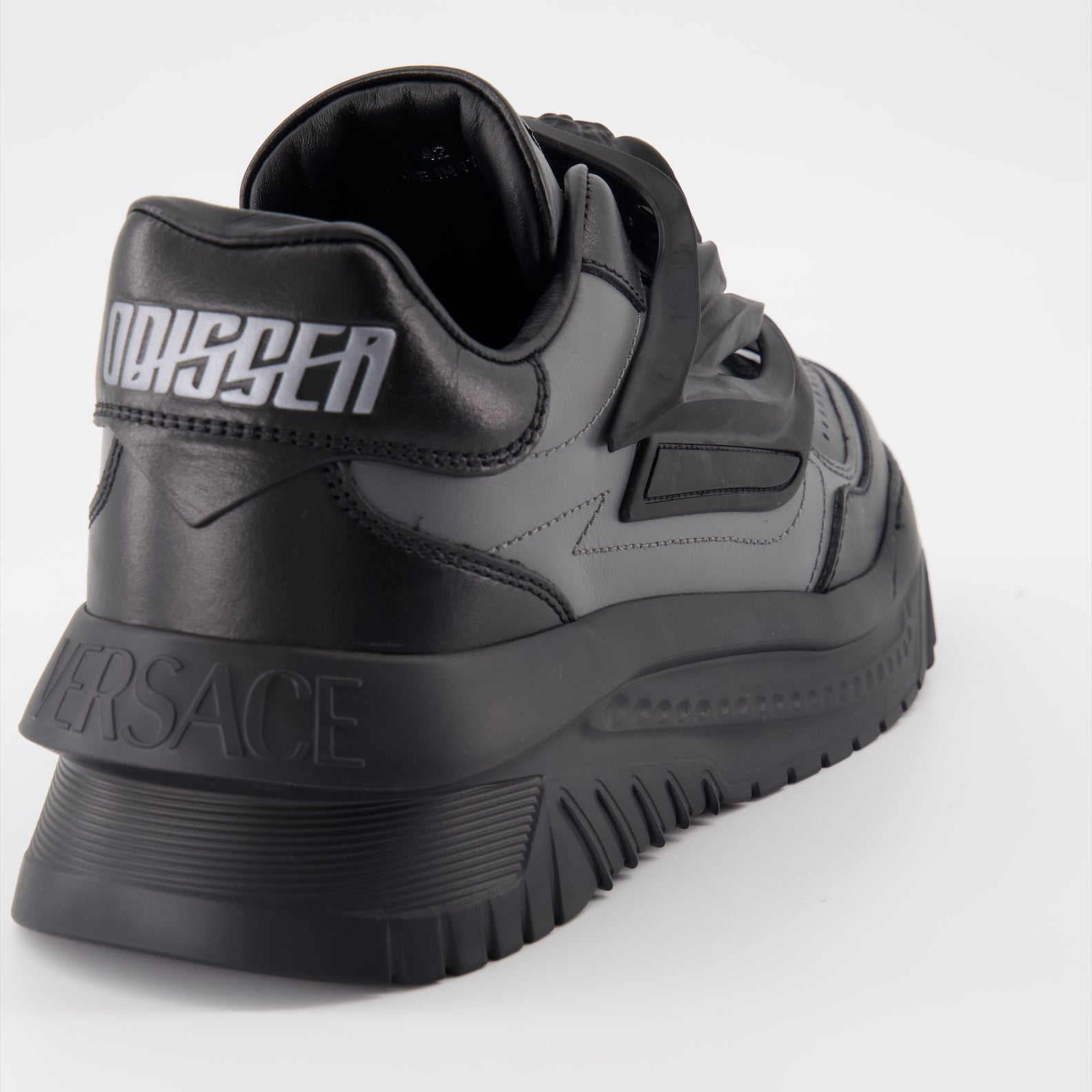 Versace sneakers, black leather sneakers, luxury footwear, high-end sneakers, designer shoes