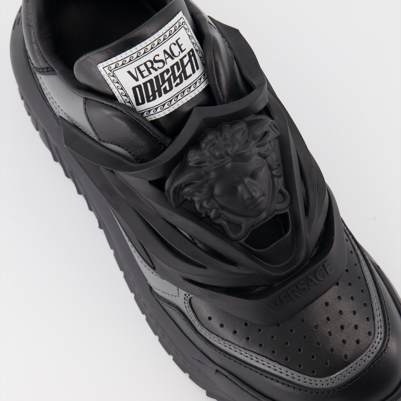 Versace sneakers, black leather sneakers, luxury footwear, high-end sneakers, designer shoes