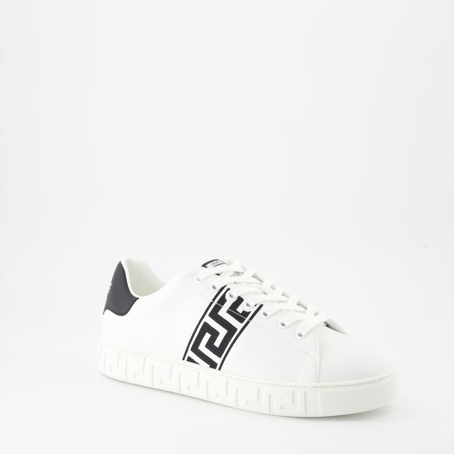 Versace sneakers, black embroidered sneakers, luxury footwear, Greca pattern, elegant casual shoes