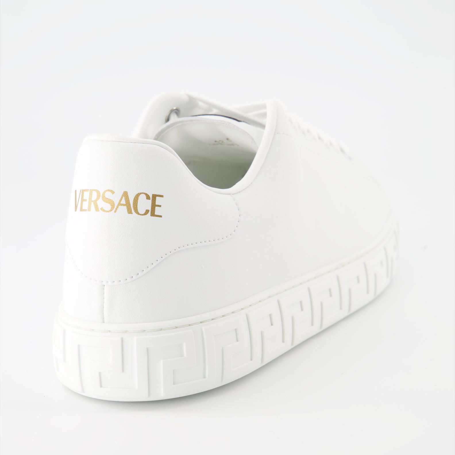 luxury sneakers, Versace footwear, white sneakers, Greca pattern, premium sneakers