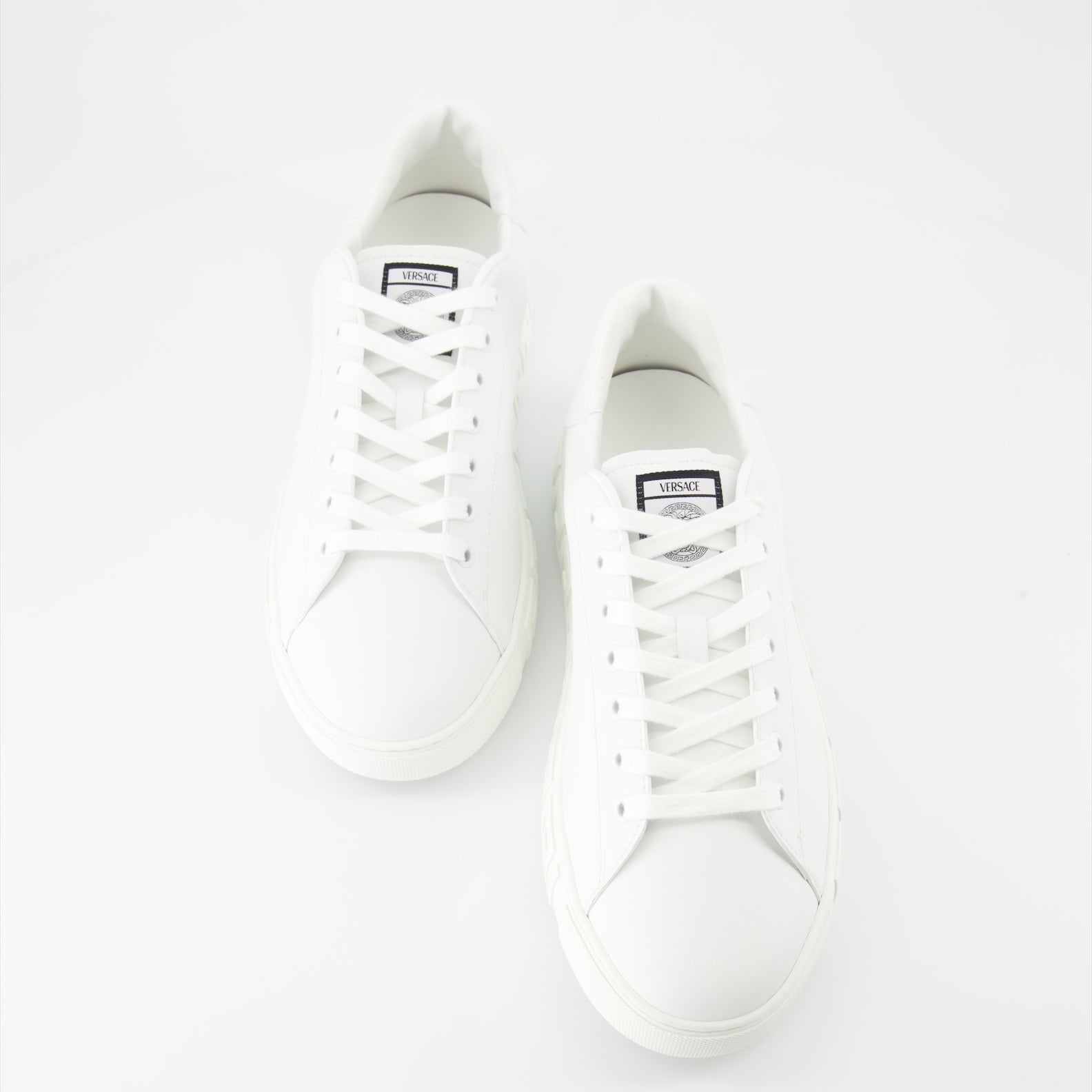 luxury sneakers, Versace footwear, white sneakers, Greca pattern, premium sneakers