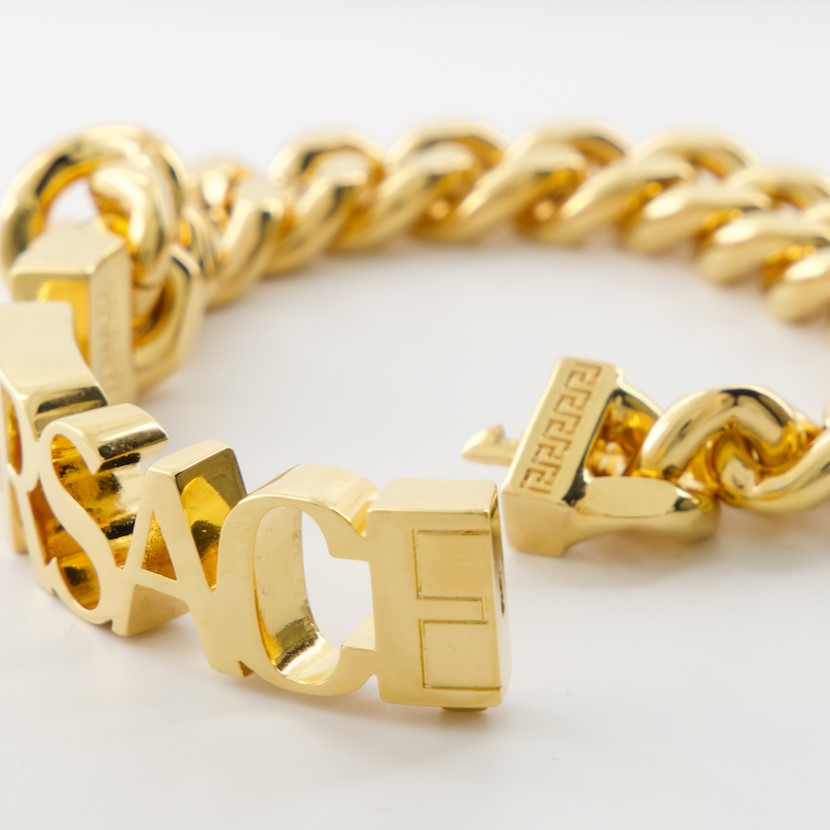 Versace bracelet, gold link bracelet, luxury jewelry, high-end accessories, elegant wristwear