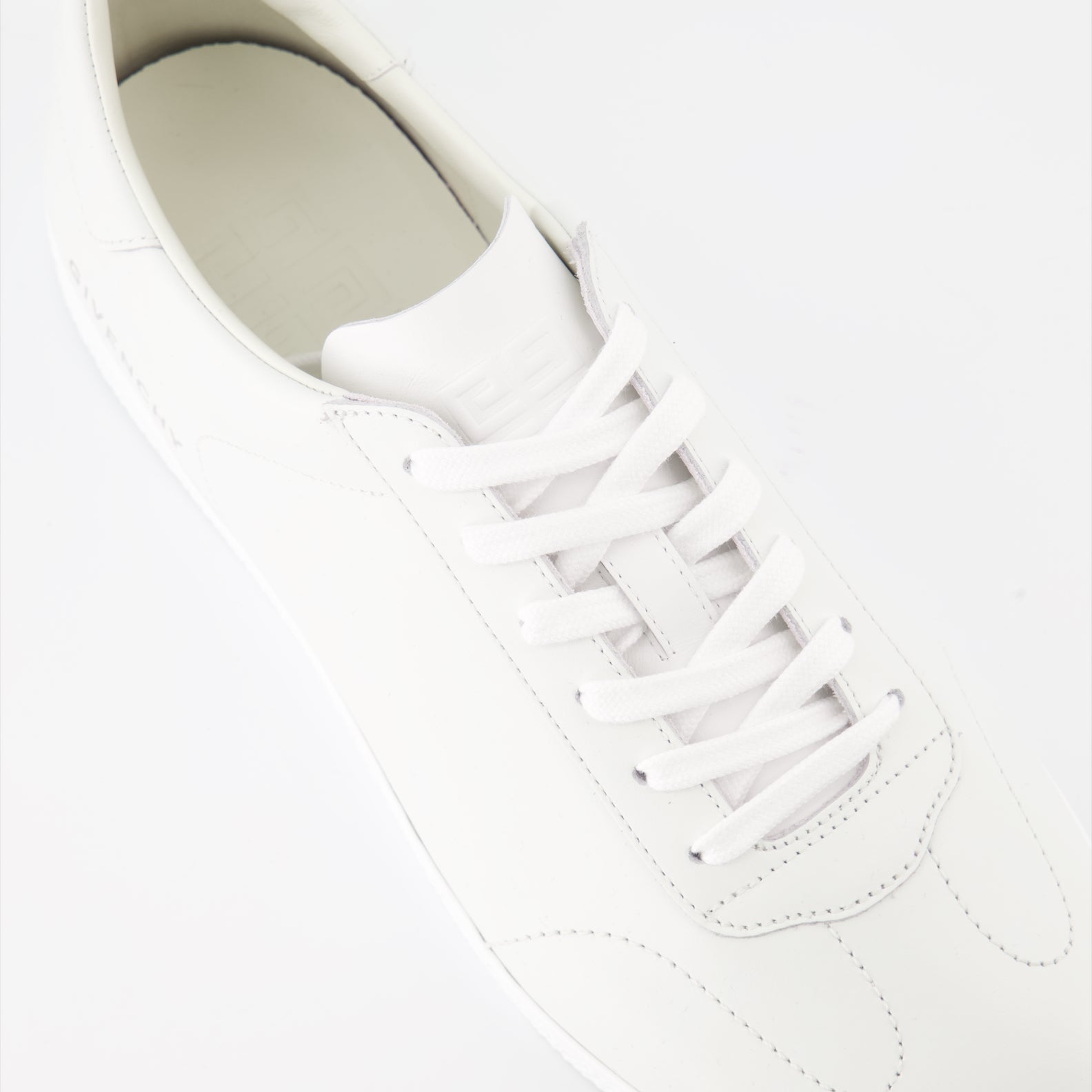 white leather sneakers, Givenchy sneakers, luxury sneakers, designer footwear, high-end sneakers