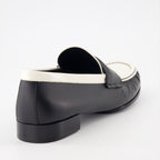 Givenchy leather moccasins, luxury footwear, 4G emblem shoes, elegant moccasins, white and black moccasins