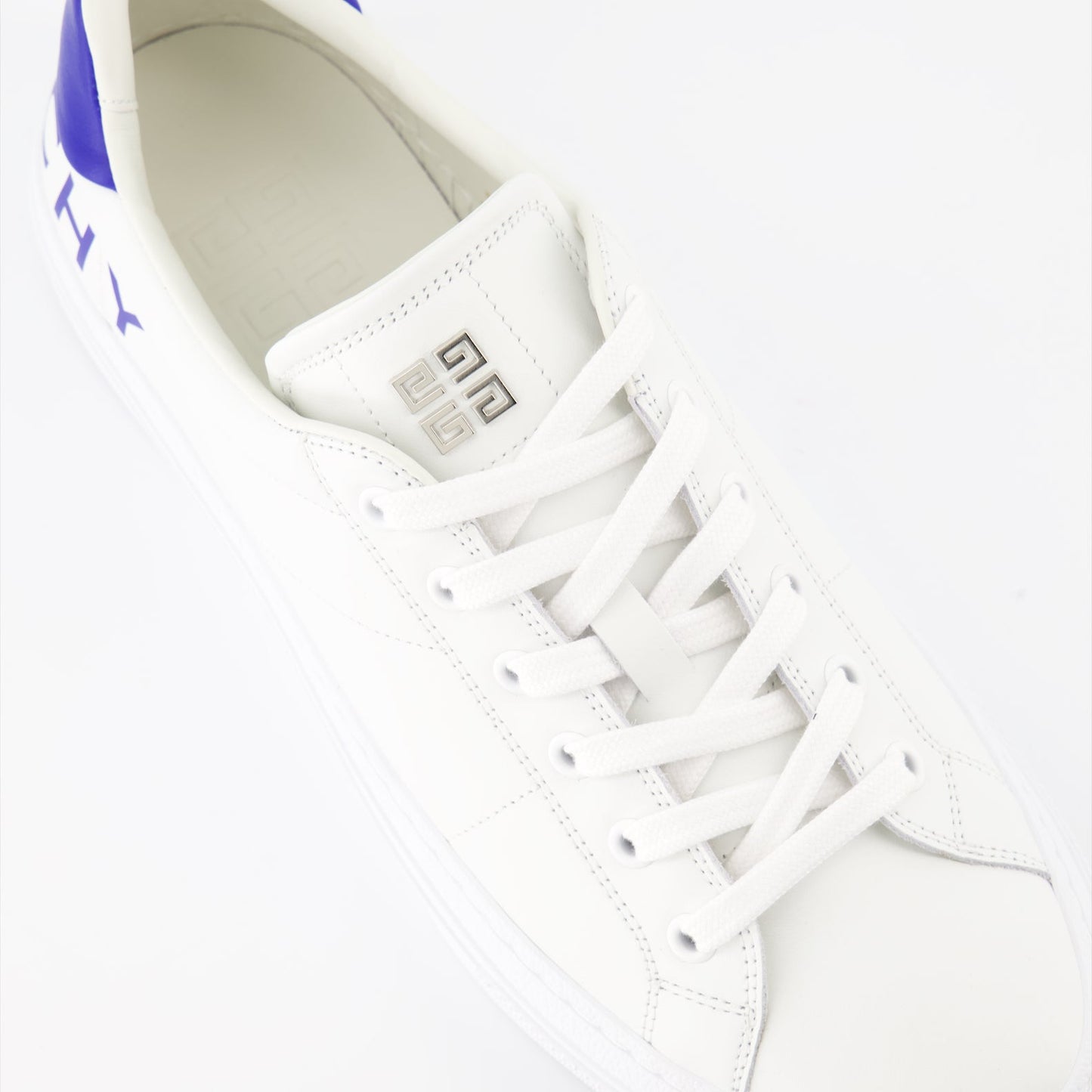 Givenchy sneakers, luxury footwear, white leather sneakers, designer sneakers, high-end fashion