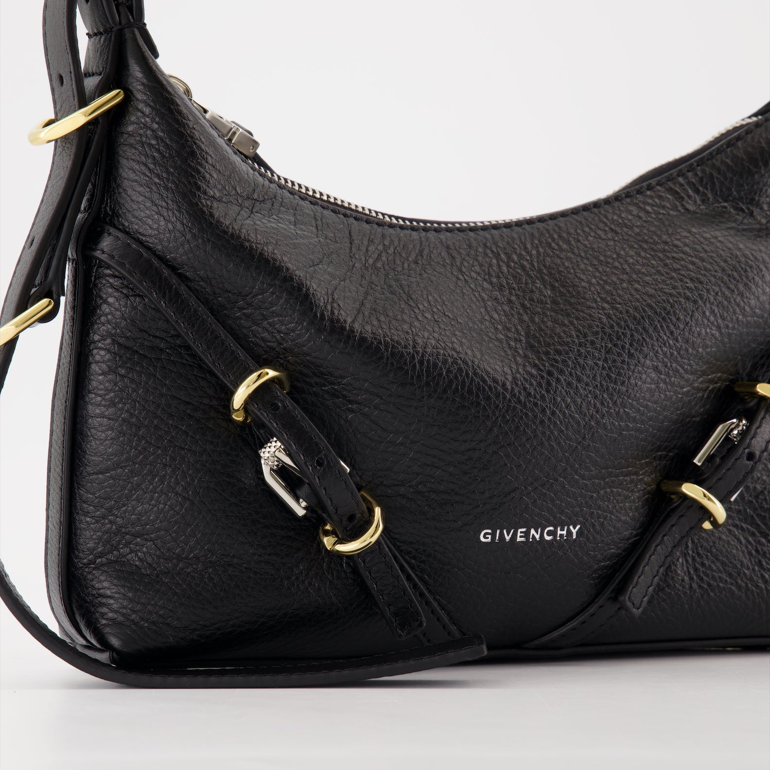 Givenchy, black leather bag, luxury mini bag, elegant accessory, Petite Voyou