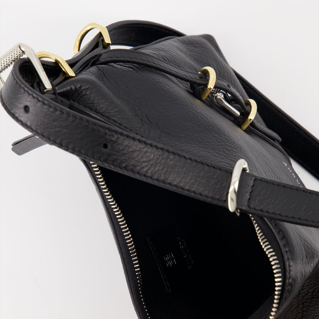 Givenchy, black leather bag, luxury mini bag, elegant accessory, Petite Voyou