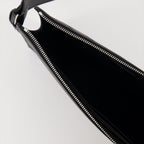 Fendi, black leather pouch, luxury accessory, sophisticated design, designer pouch