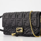 Image of Black Leather Baguette Chain Wallet by Fendi for Women - Season Autumn-Winter 2024 - Detail View 1