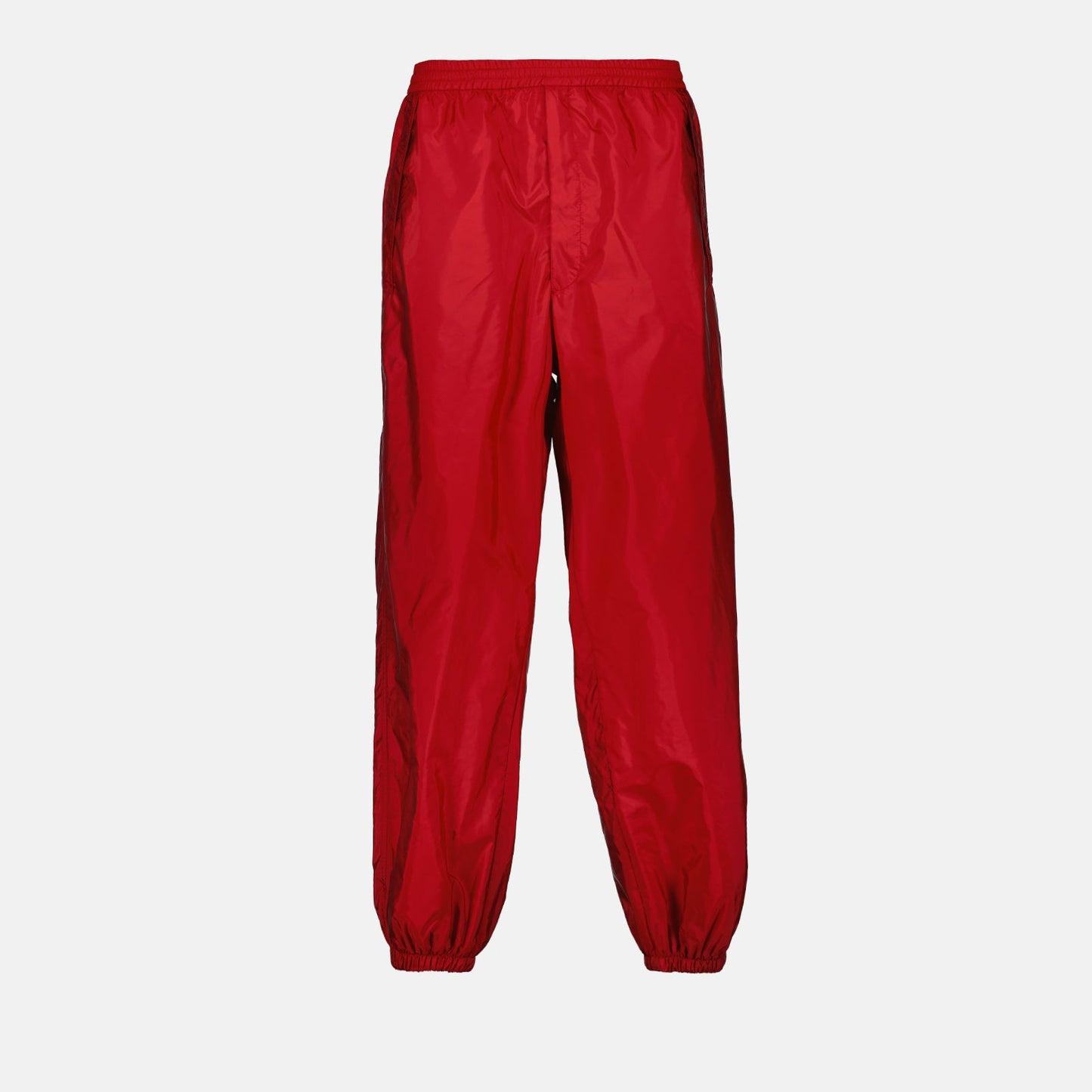 Prada jogging pants, Re-Nylon pants, luxury activewear, eco-friendly fashion, red jogging pants