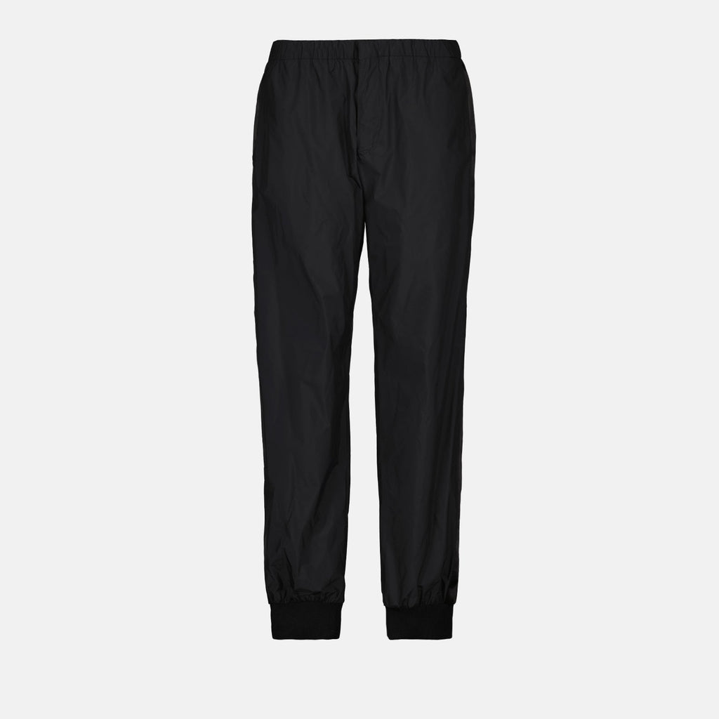 Image de pantalons de jogging en soie noire et nylon par Prada pour hommes - Saison Printemps-Été 2024 - Vue de face