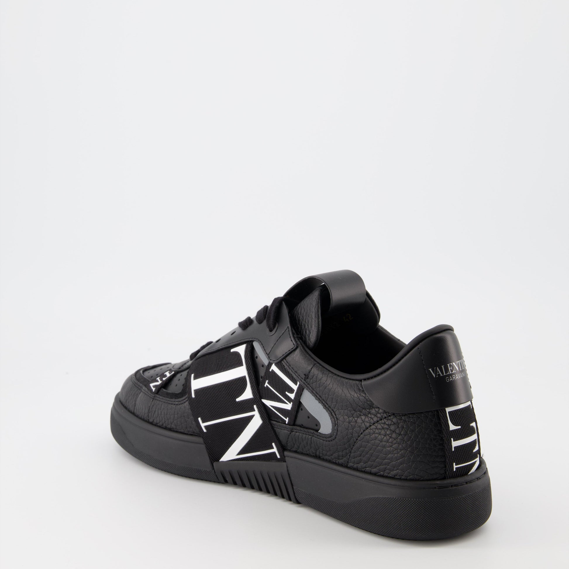 luxury sneakers, Valentino Garavani, black leather sneakers, designer footwear, high-end fashion