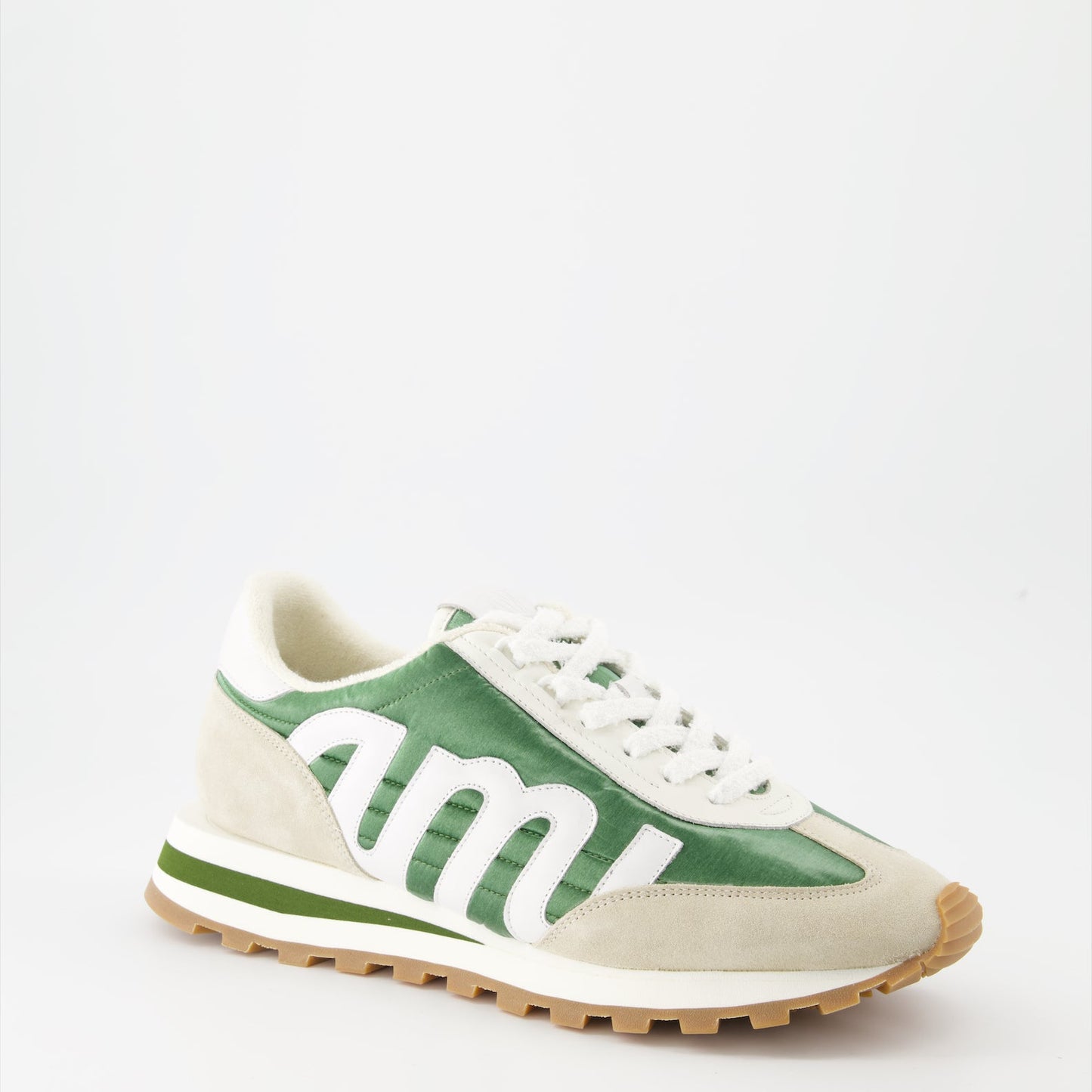 AMI Rush sneakers, green nylon sneakers, beige leather sneakers, luxury men's footwear, designer sneakers