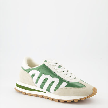 AMI Rush sneakers, green nylon sneakers, beige leather sneakers, luxury men's footwear, designer sneakers