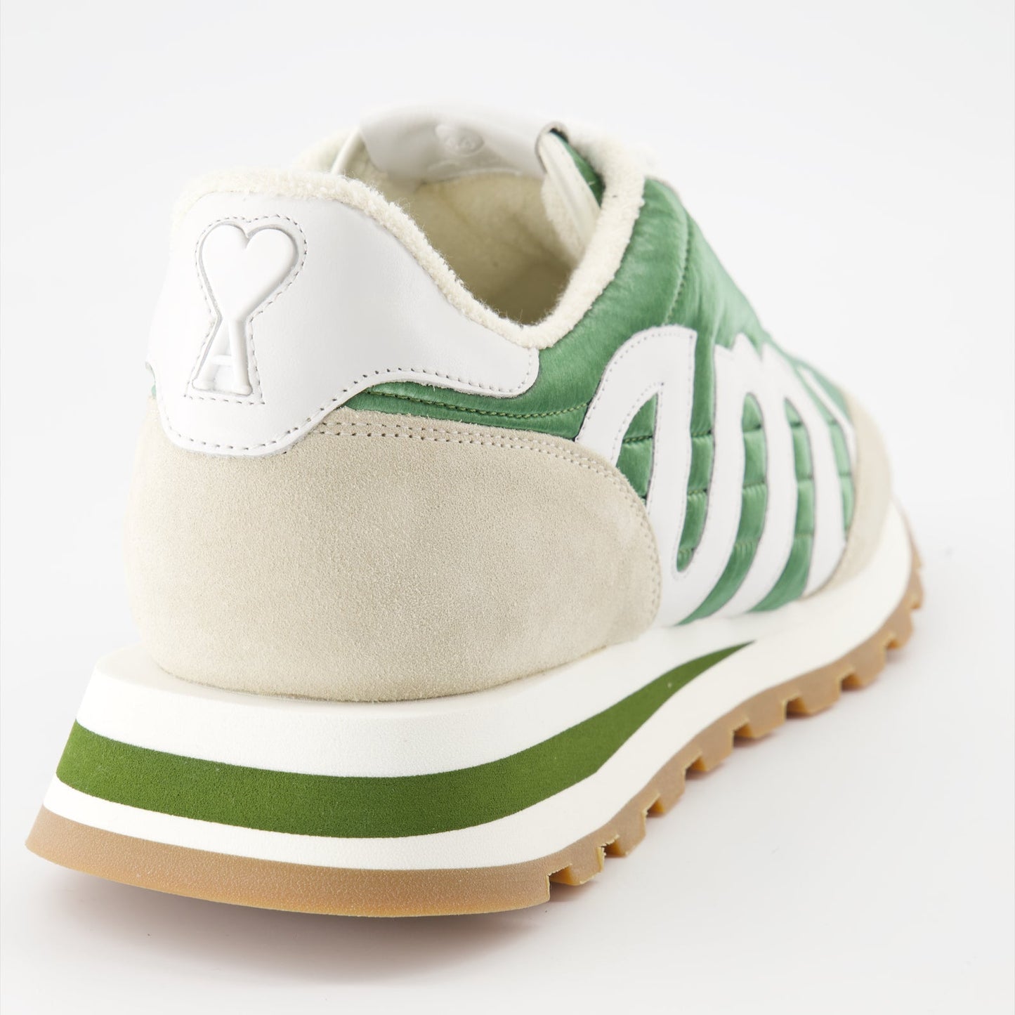 AMI Rush sneakers, green nylon sneakers, beige leather sneakers, luxury men's footwear, designer sneakers