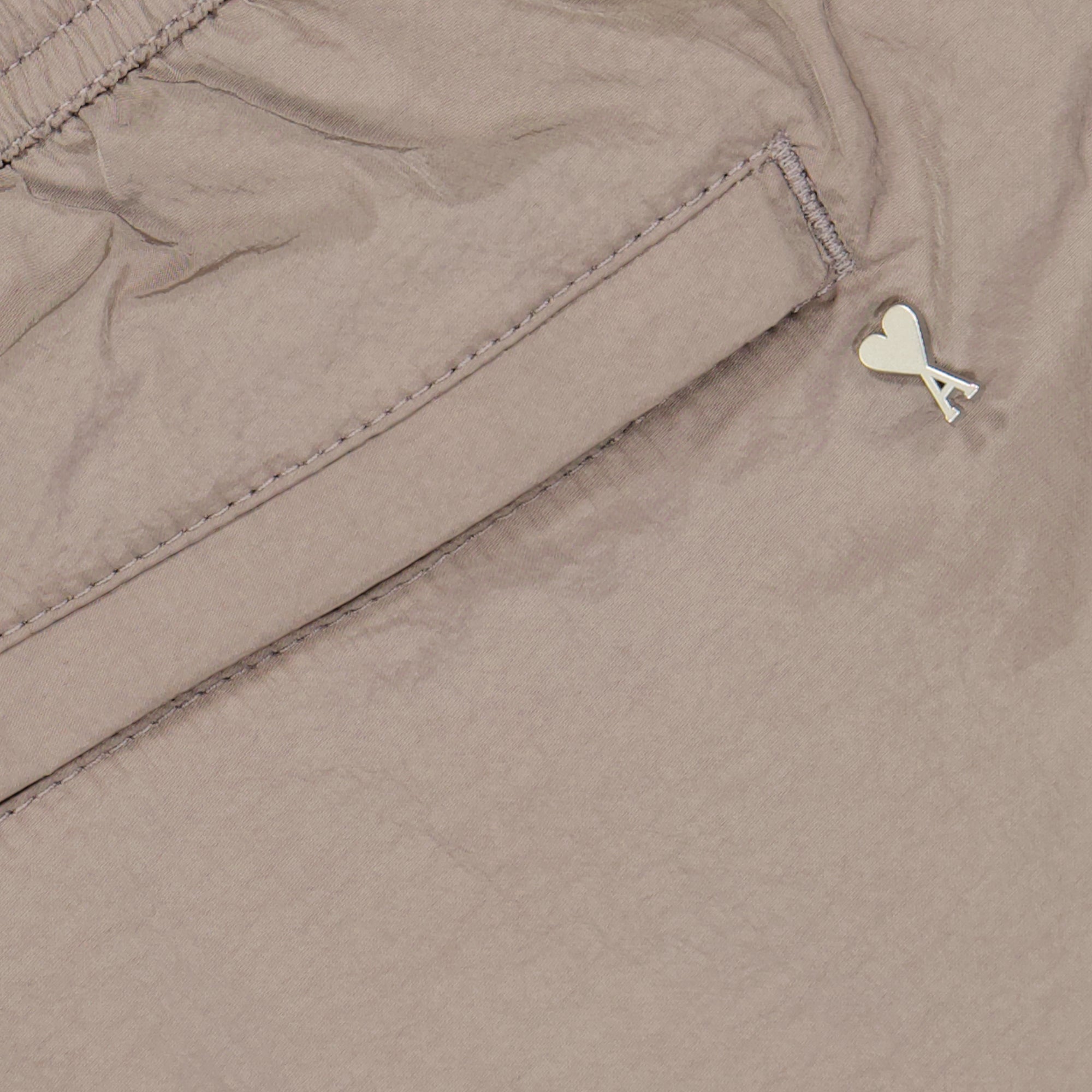 Ami de Coeur, AMI Paris swim shorts, beige nylon shorts, luxury swimwear, designer swim shorts