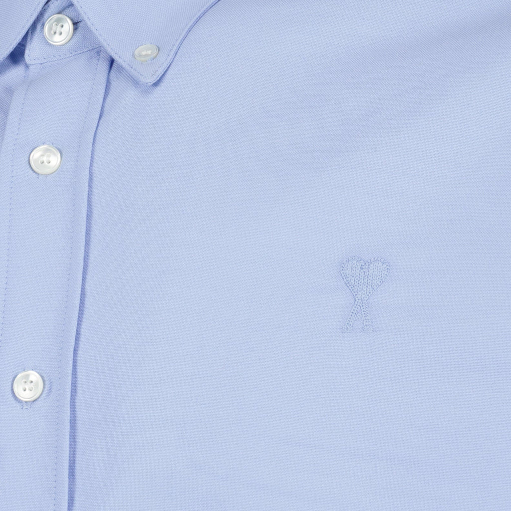 unisex blue shirt, Ami de Coeur, AMI Paris shirt, elegant blue shirt, luxury wardrobe essential