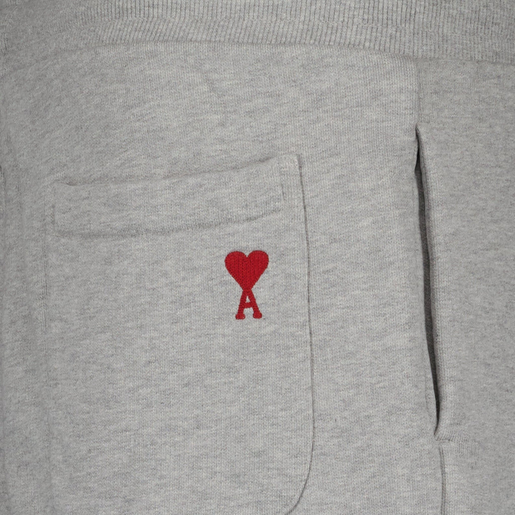 luxury jogging trousers, AMI Paris joggers, grey cotton trousers, unisex jogging pants, high-end casual wear