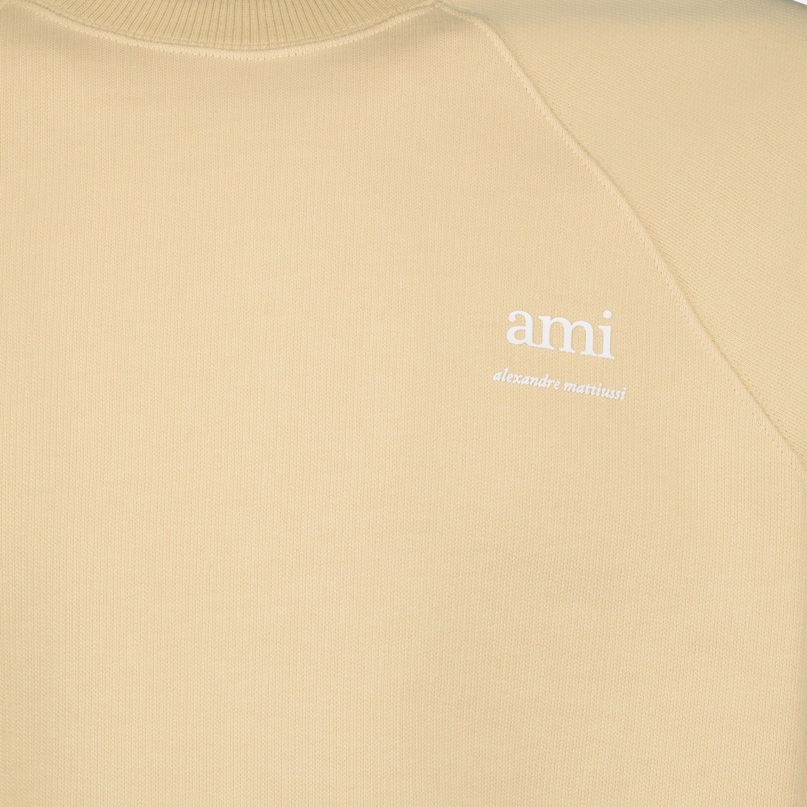 Beige sweatshirt, AMI Paris sweatshirt, embroidered logo sweatshirt, luxury casual wear, elegant fashion basics