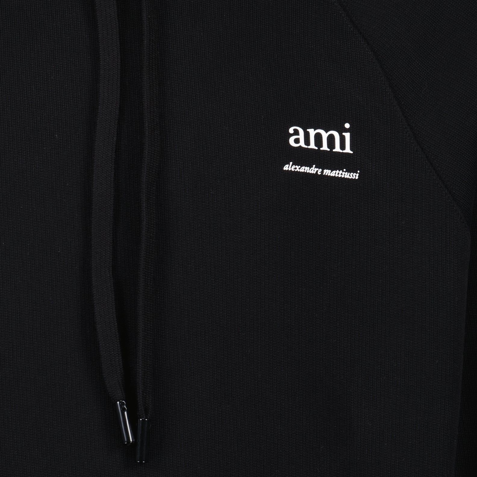 AMI hoodie, luxury streetwear, unisex fashion, black logo hoodie, high-end comfort