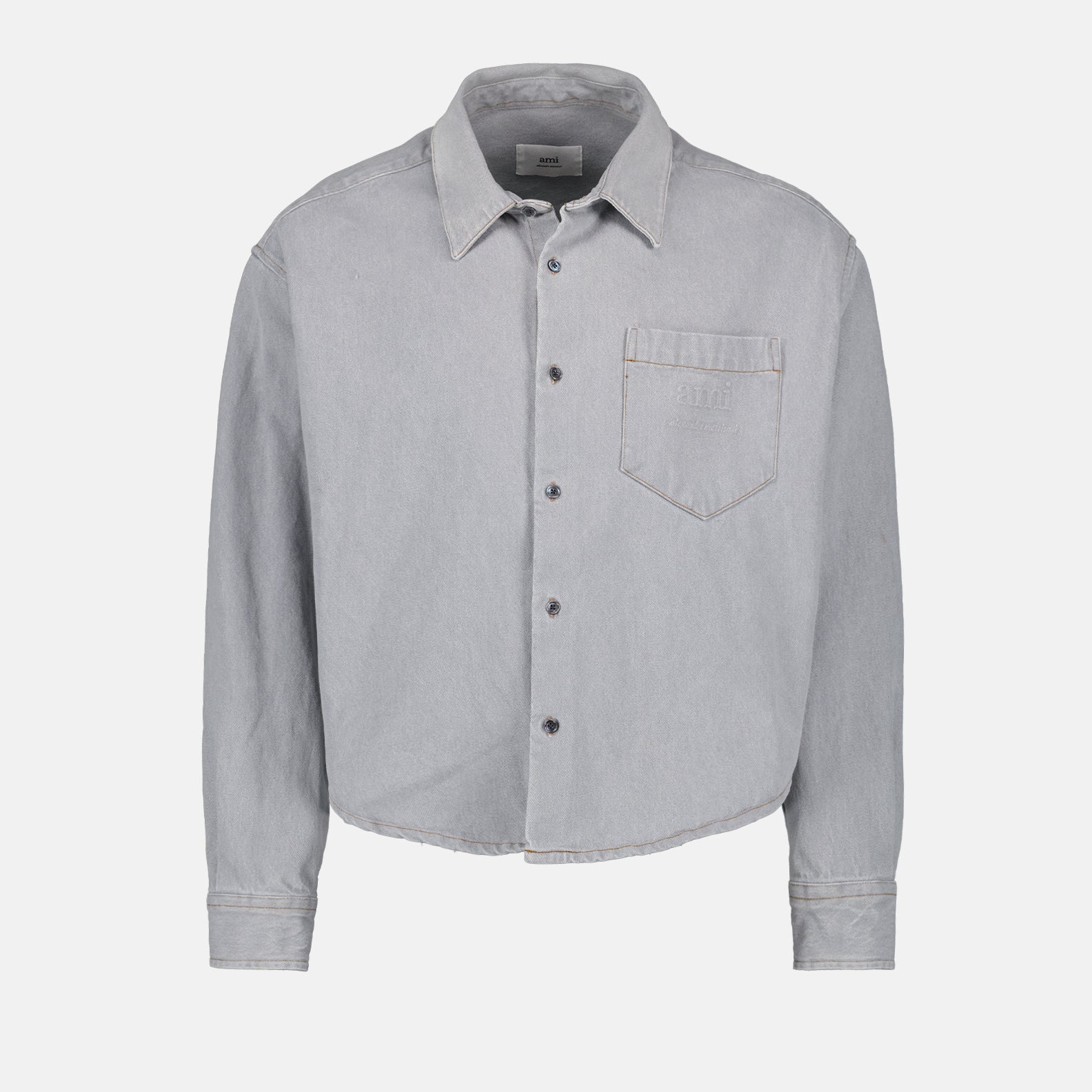 1. Distressed grey denim shirt2. AMI Paris3. Luxury casual wear4. High-quality denim5. Timeless fashion