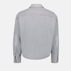 1. Distressed grey denim shirt2. AMI Paris3. Luxury casual wear4. High-quality denim5. Timeless fashion