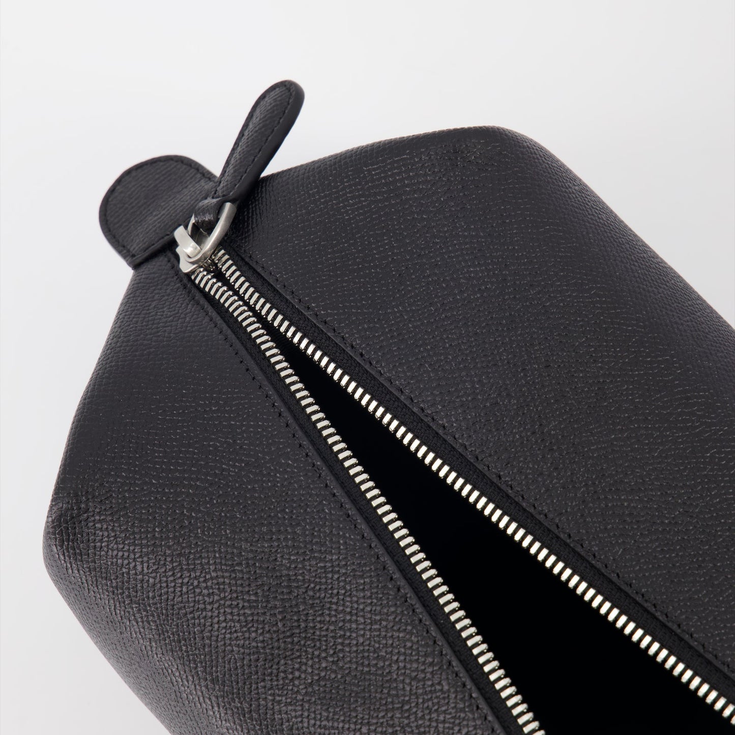 black leather pochette, Ami de Coeur, AMI Paris, luxury accessory, unisex pochette