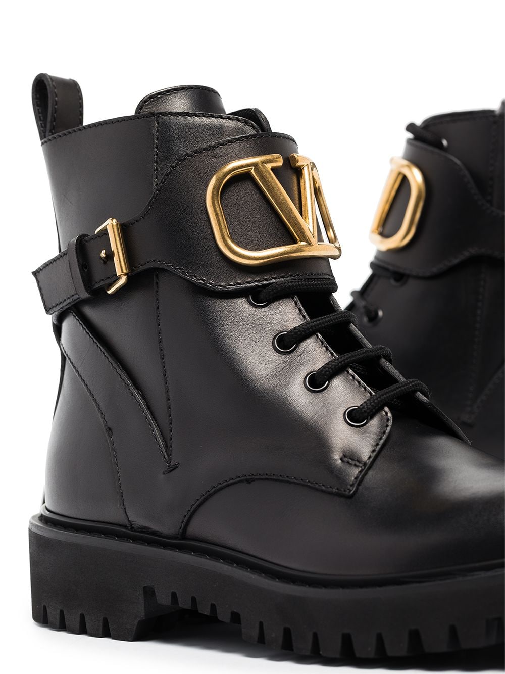 Valentino Garavani, black ankle boots, luxury footwear, elegant style, quality leather