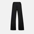 Oblique jogger pants, drawstring waist, embroidered logo, side motif, piped pockets