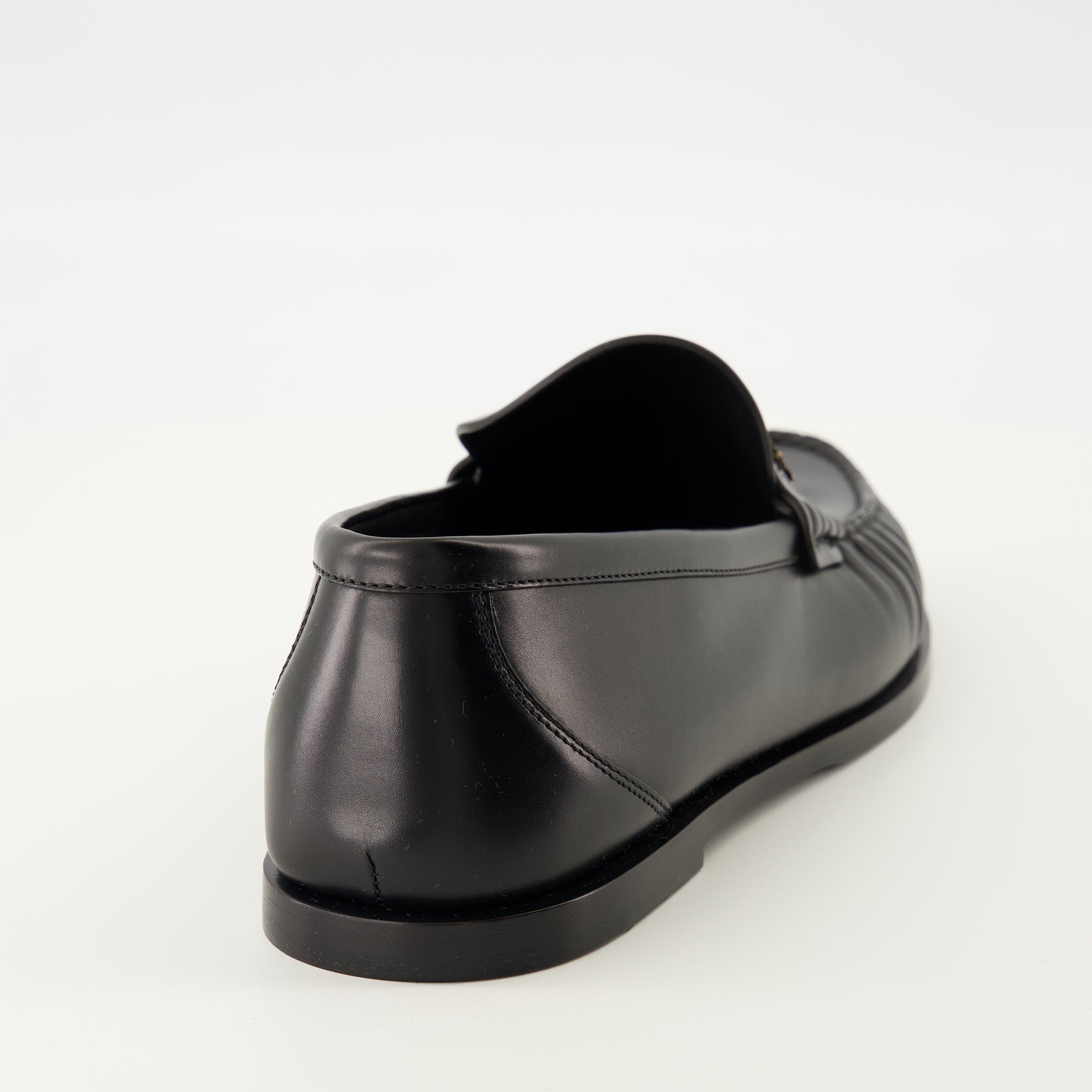 Saint Laurent loafers, black leather shoes, luxury footwear, rounded toe loafers, men's slip-on shoes