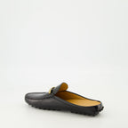 Image de mules en cuir Gommino noires de Tod's pour femmes - Saison Printemps-Été 2025 - Vue arrière droite en trois quarts