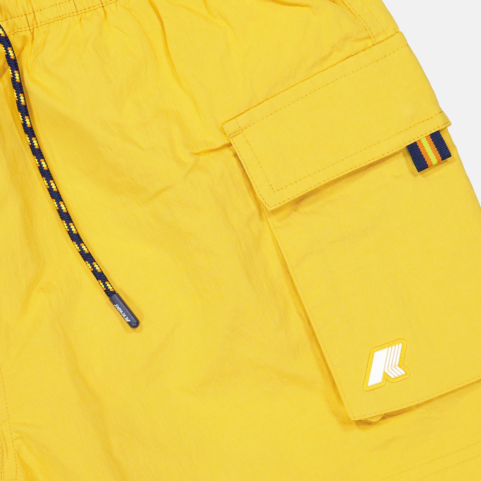 swim shorts, luxury swimwear, K-Way, yellow nylon shorts, men's swimwear