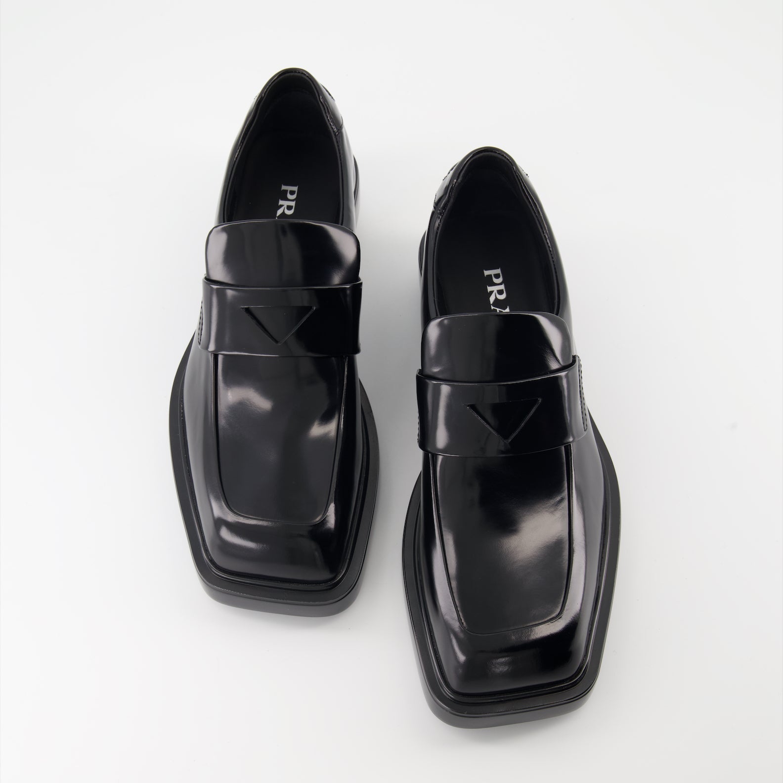 Prada mocassins, brushed leather shoes, luxury footwear, black leather mocassins, designer shoes