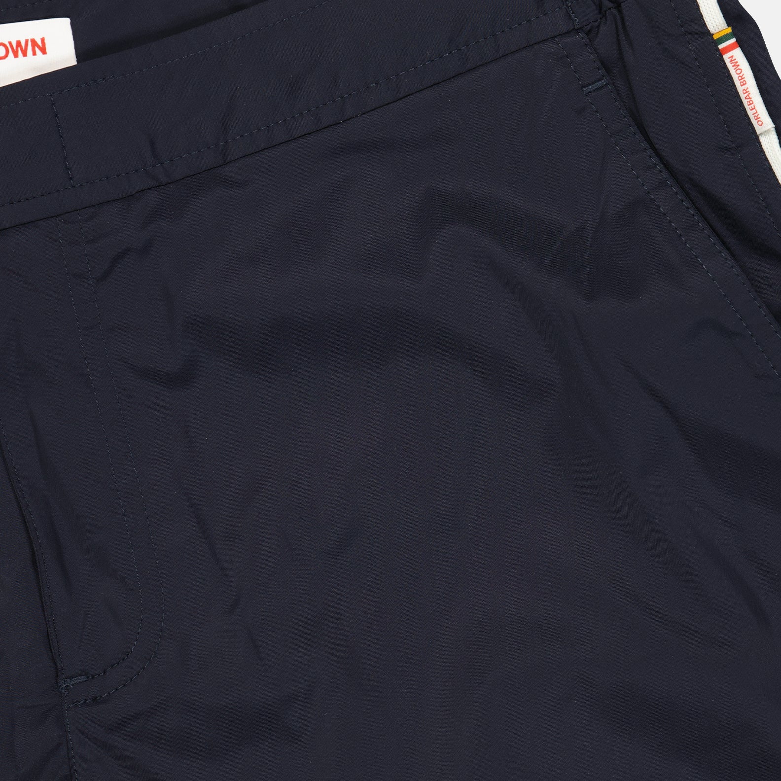 swim shorts, luxury swimwear, Orlebar Brown, navy blue stretch, tailored swim shorts