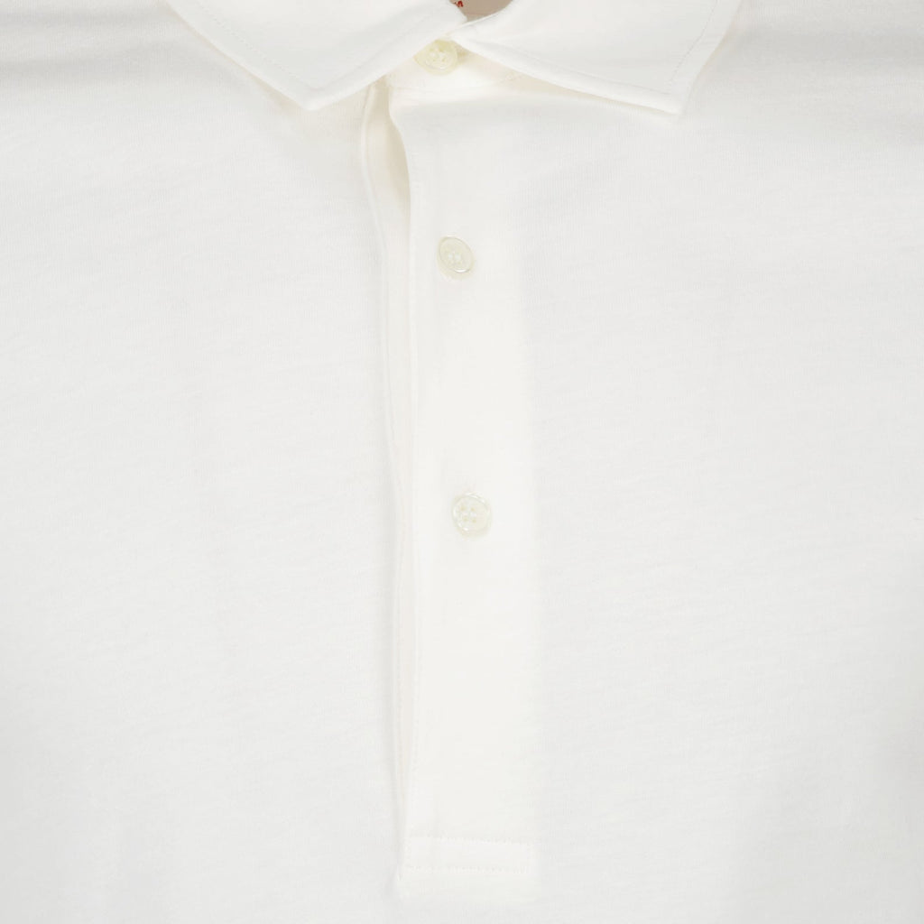 luxury polo, cotton silk blend, Orlebar Brown polo, elegant white polo, high-end menswear